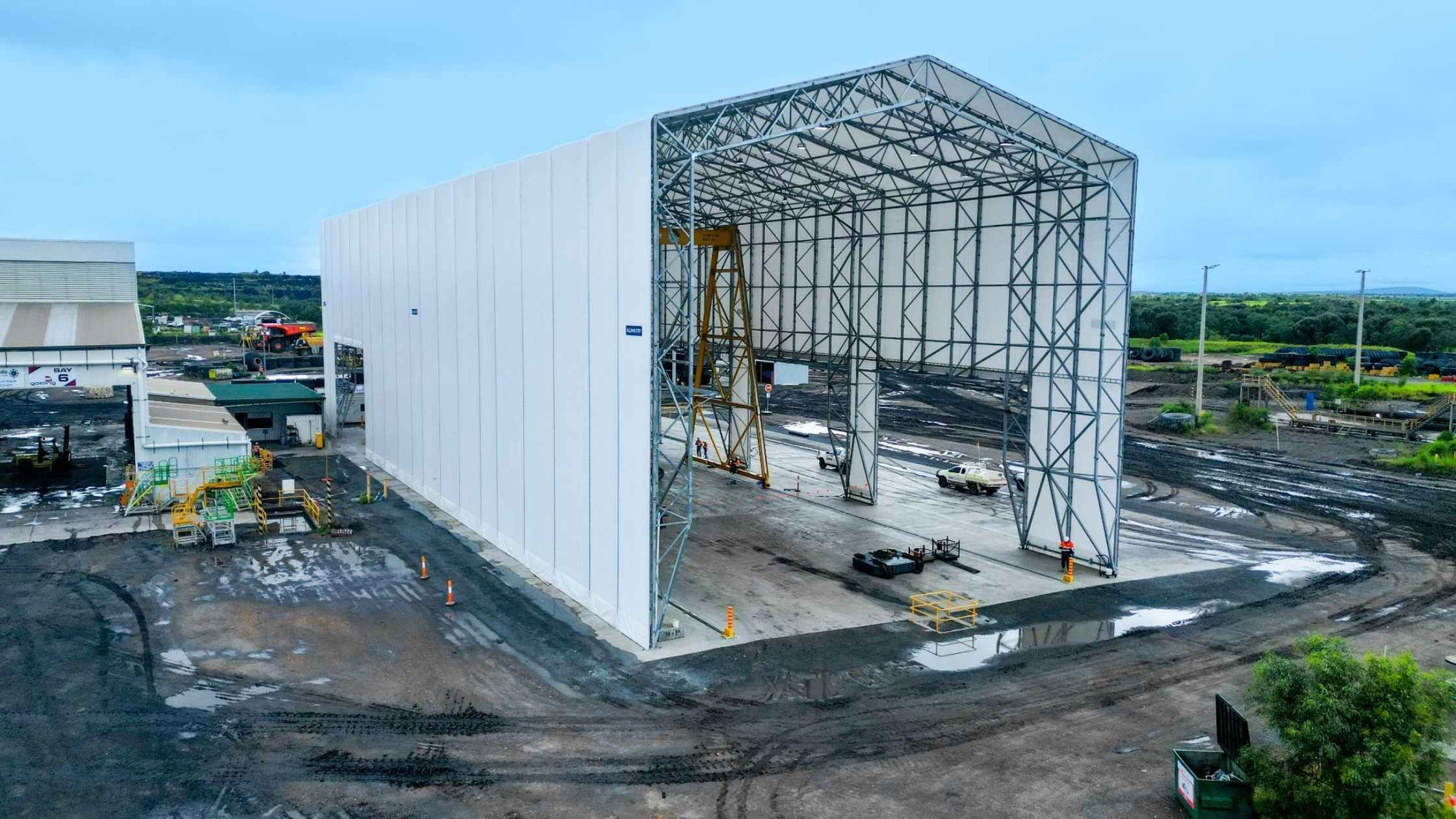 Enhancing Mining Efficiency: Coronado Curragh’s Custom Shelter for Dump Truck Servicing