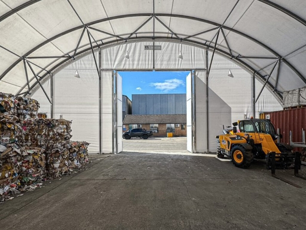 Shipping Container Mounted Shelter for Waste Management